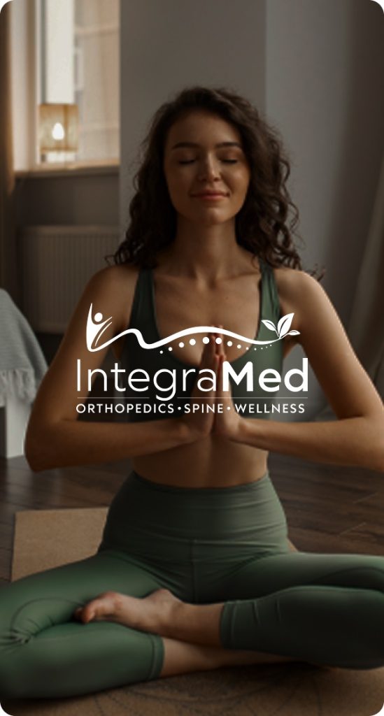 Integramed logo with a woman meditating, representing health and wellness