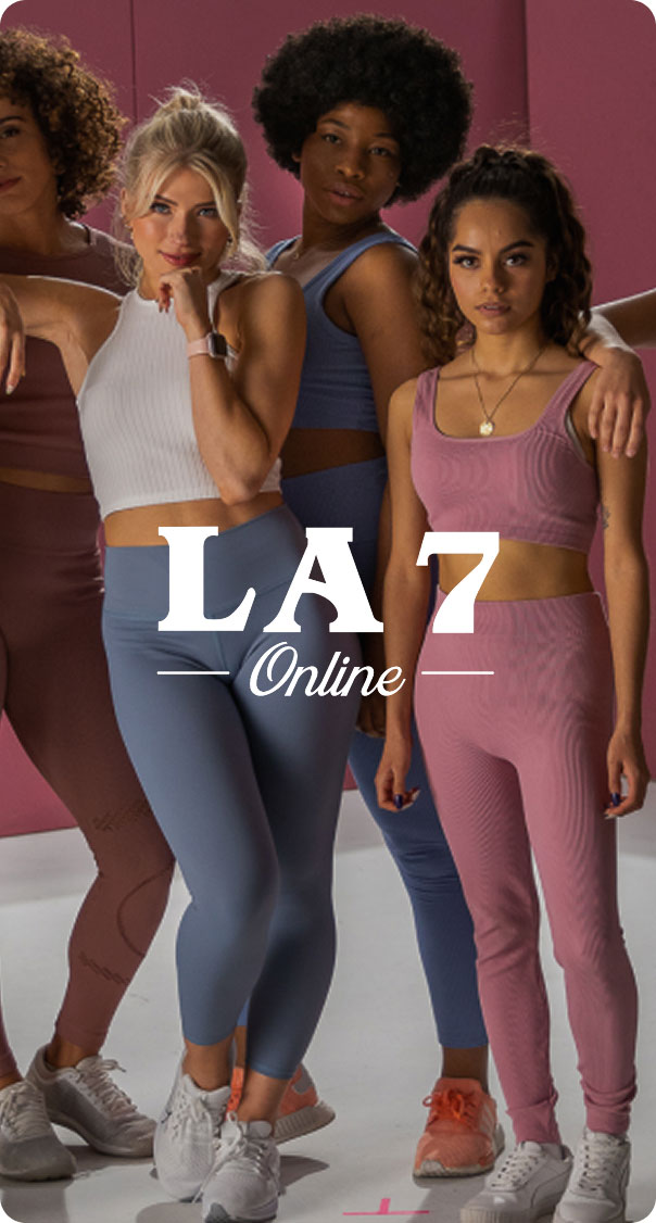 group of women wearing colorful activewear outfits, fitness fashion studio shoot, modern e-commerce branding image, miami web design company