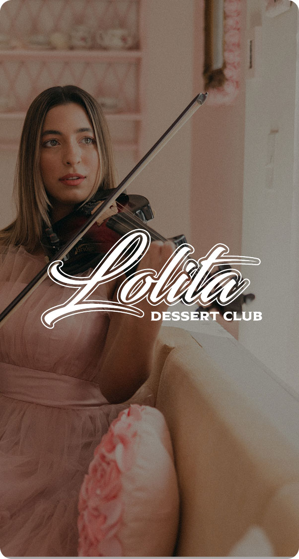 woman playing violin in elegant setting with soft lighting and pastel tones