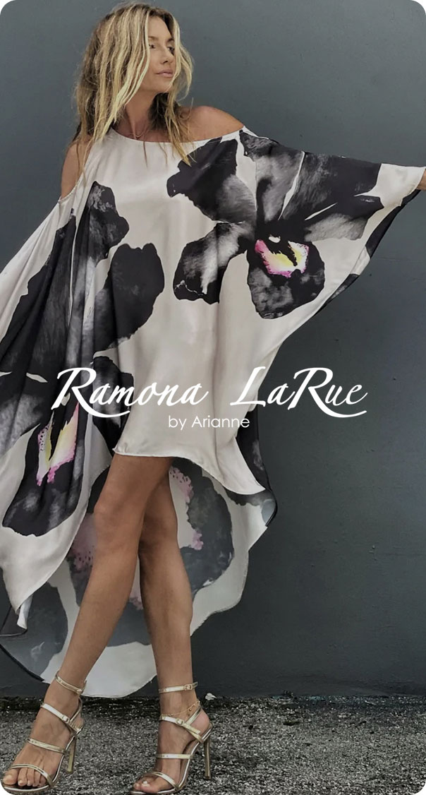 woman wearing flowy floral kaftan dress posing against minimalist background, luxury fashion concept