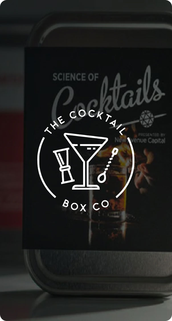 cocktail kit packaging with science of cocktails guide in metal container, premium mixology kit and home bar concept