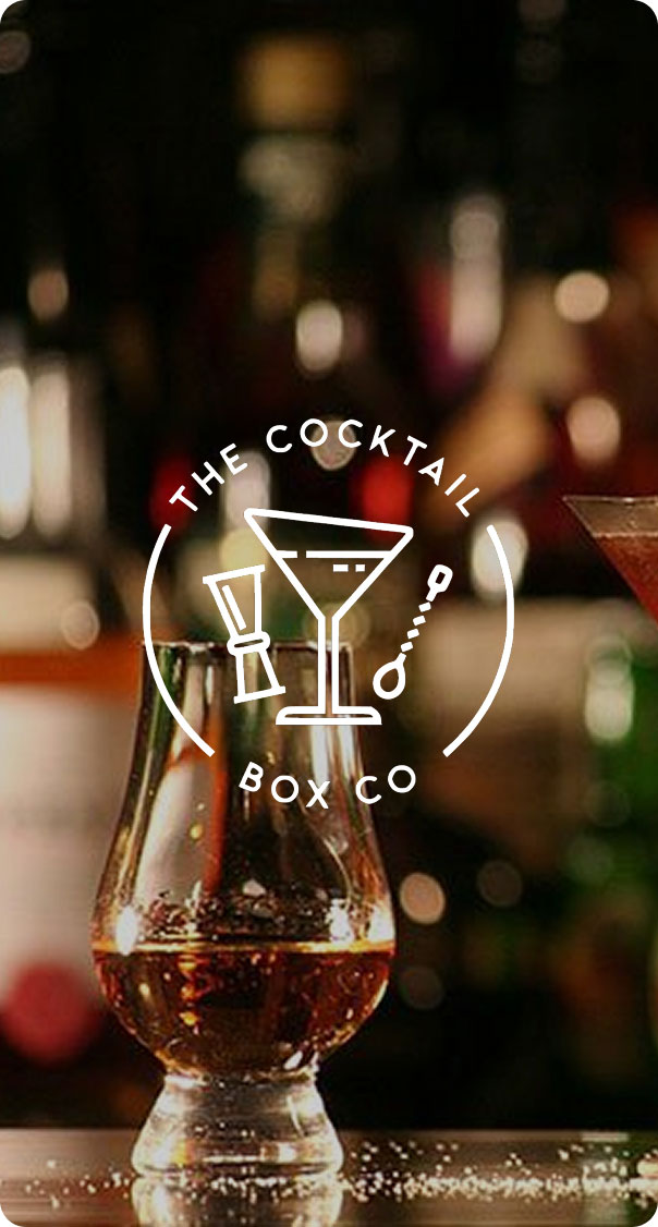 whiskey glass on bar with warm lighting and blurred background, cocktail branding image, nightlife and premium bar experience miami