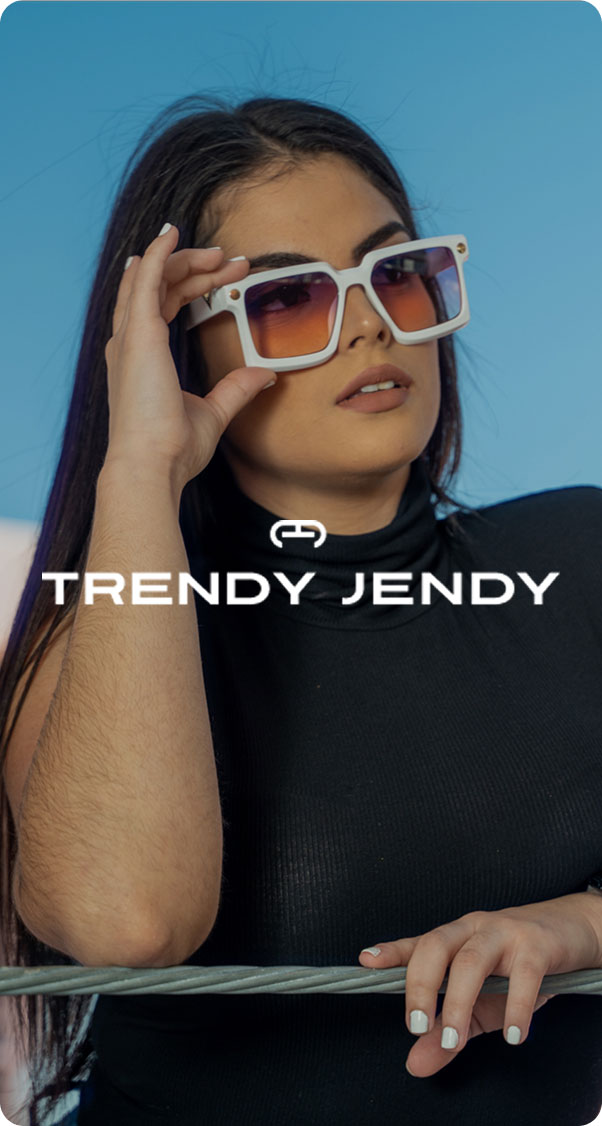 woman wearing oversized square sunglasses posing confidently against blue background, modern fashion style